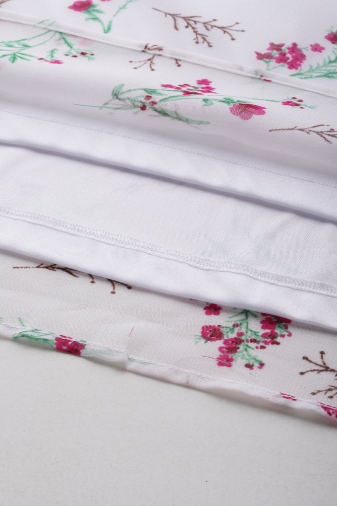 White floral cold shoulder ruffle op with bell sleeves