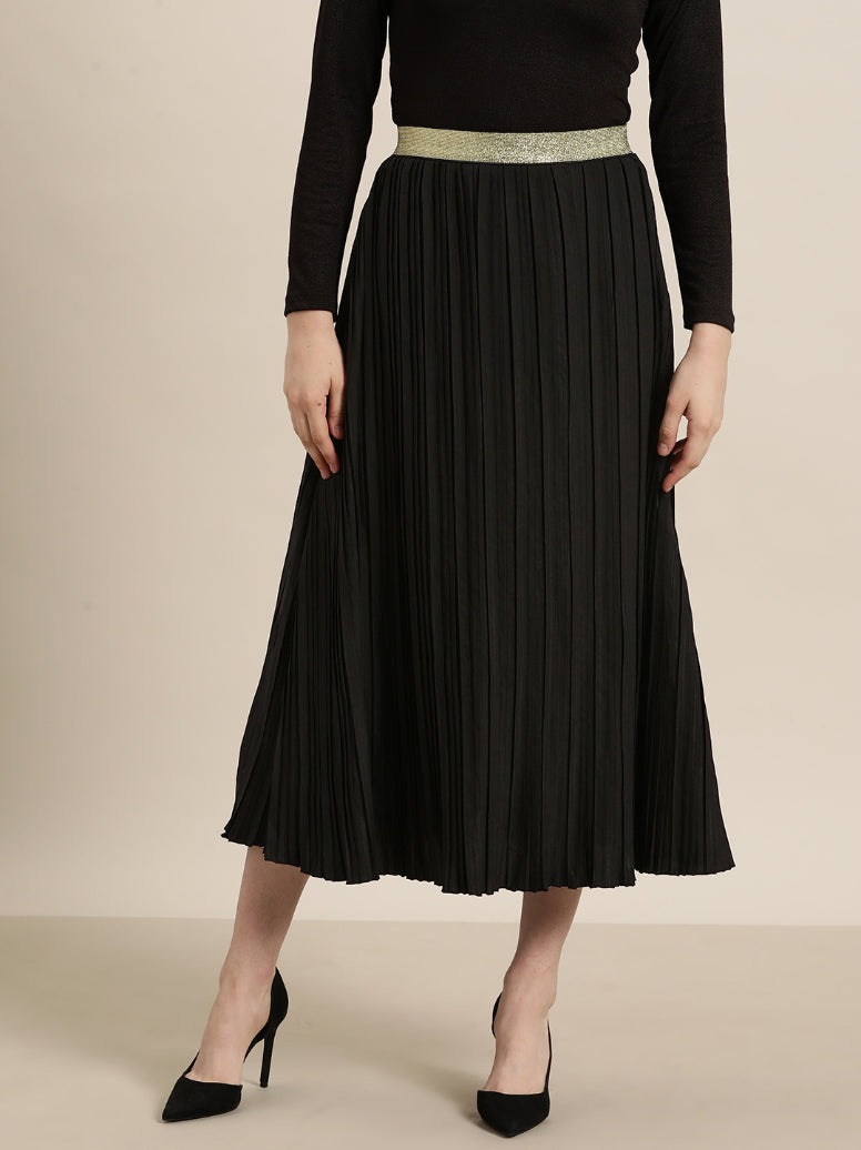 Black long pleated party skirt with a glittery elastic waistband