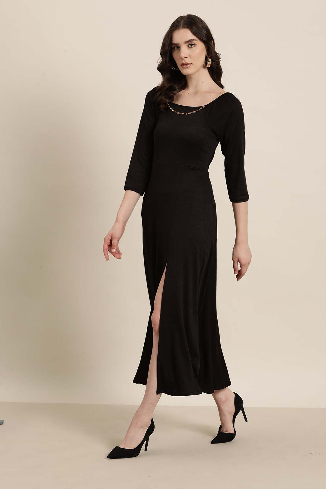 Black party long dress with gold chain embelishment