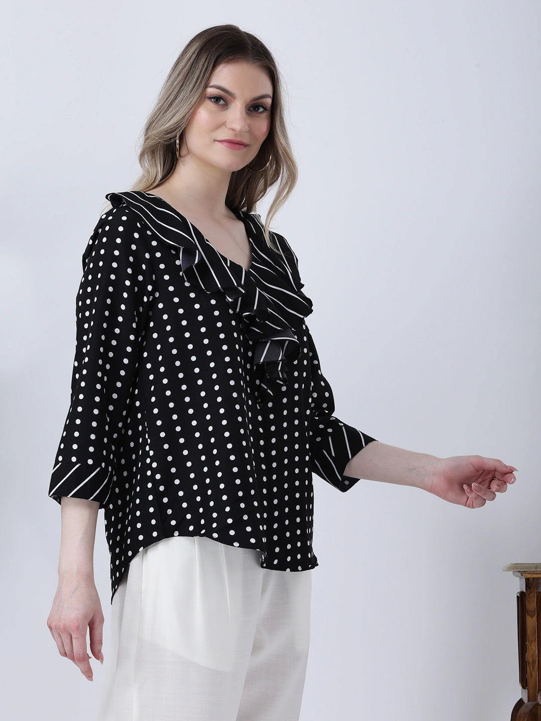 Black polka and stripe ruffle neck top