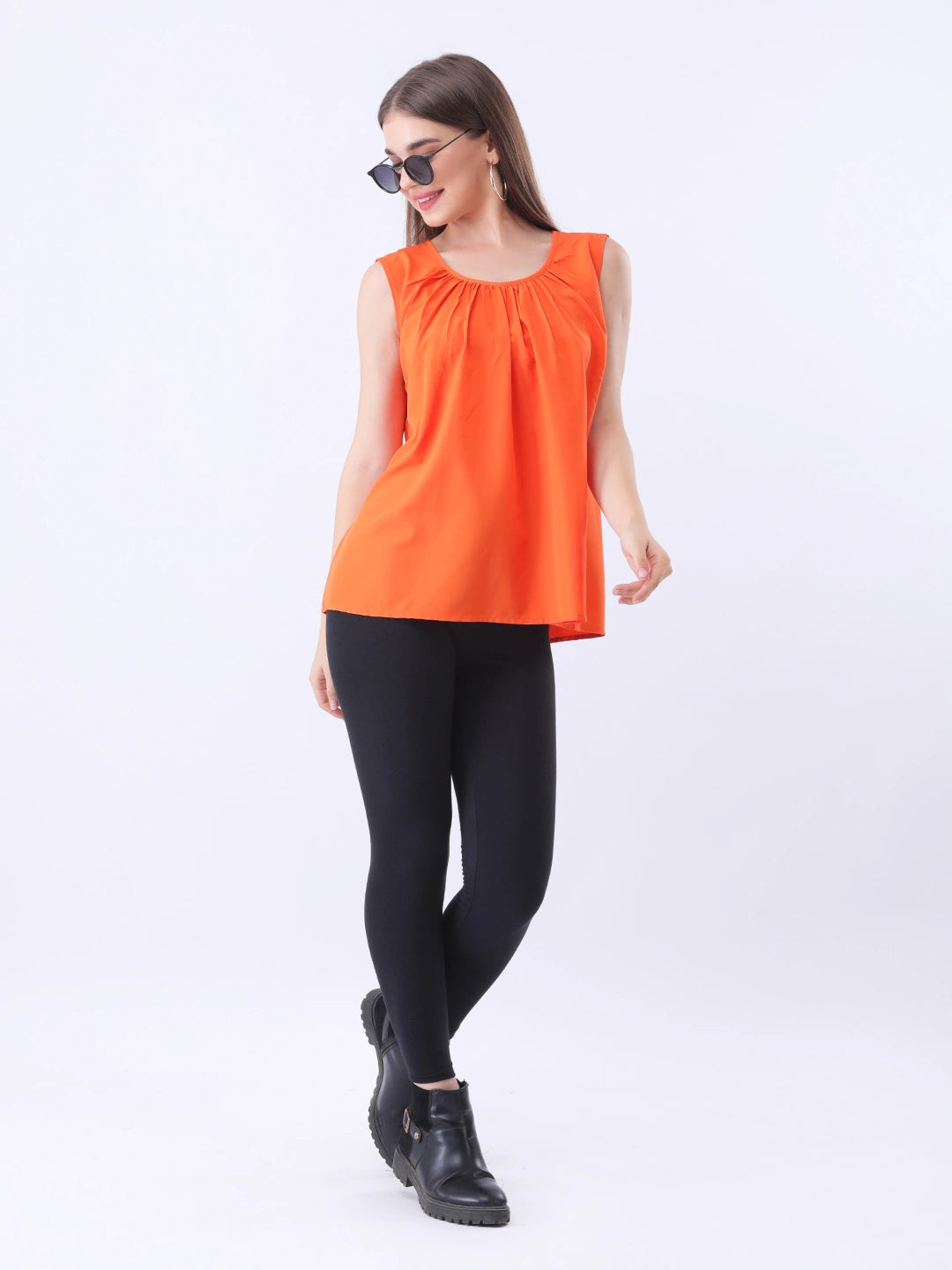 Solid orange sleeveless top
