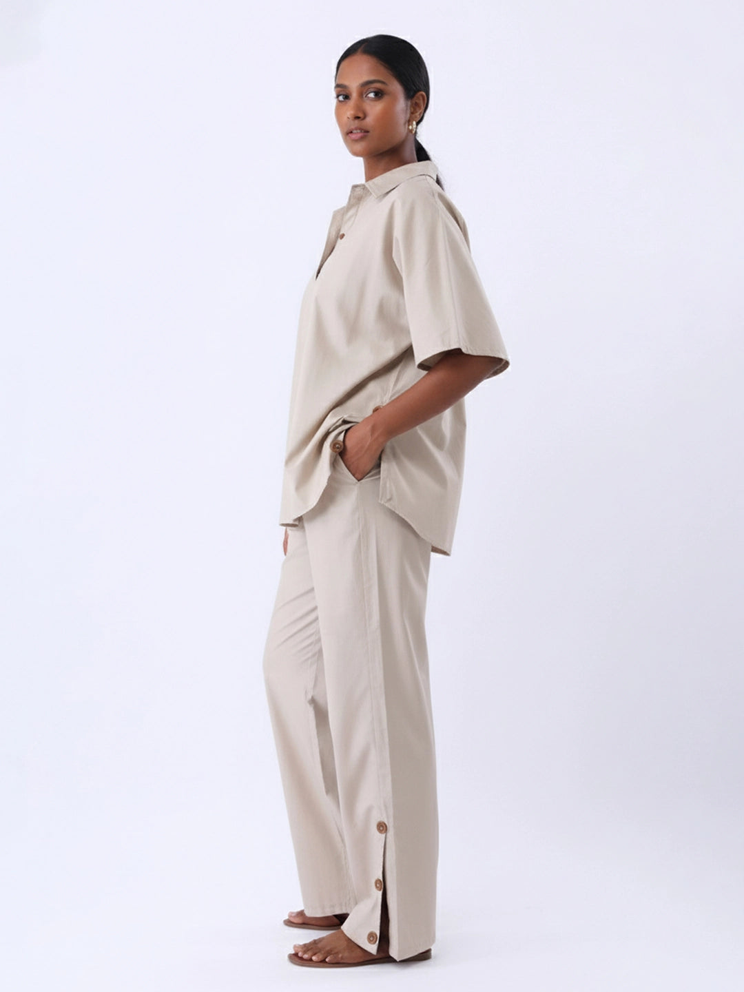 Solid polpin half placket shirt and pant with button detailing in side seam