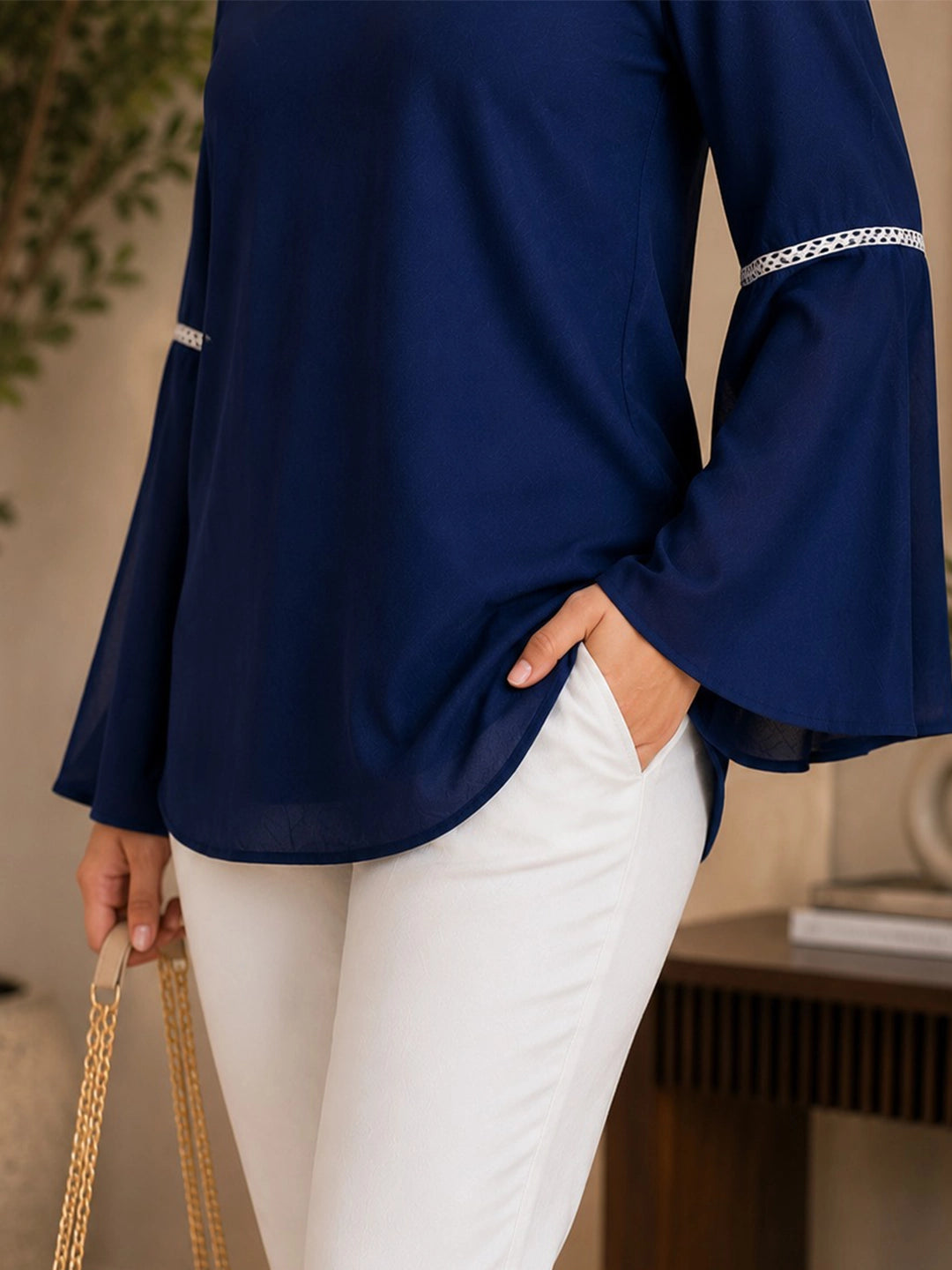Navy V- neck top with bell sleeves