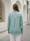 green 3 satin shirt — close-up detail