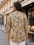 beige paisley satin shirt — close-up detail