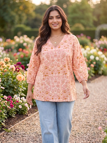 Peach printed top with puff sleeves