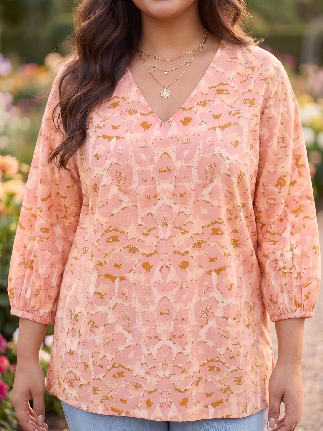 Peach printed top with puff sleeves
