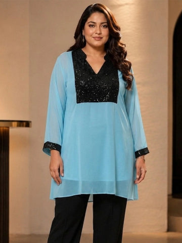 Turquoise tunic top with sequence yoke