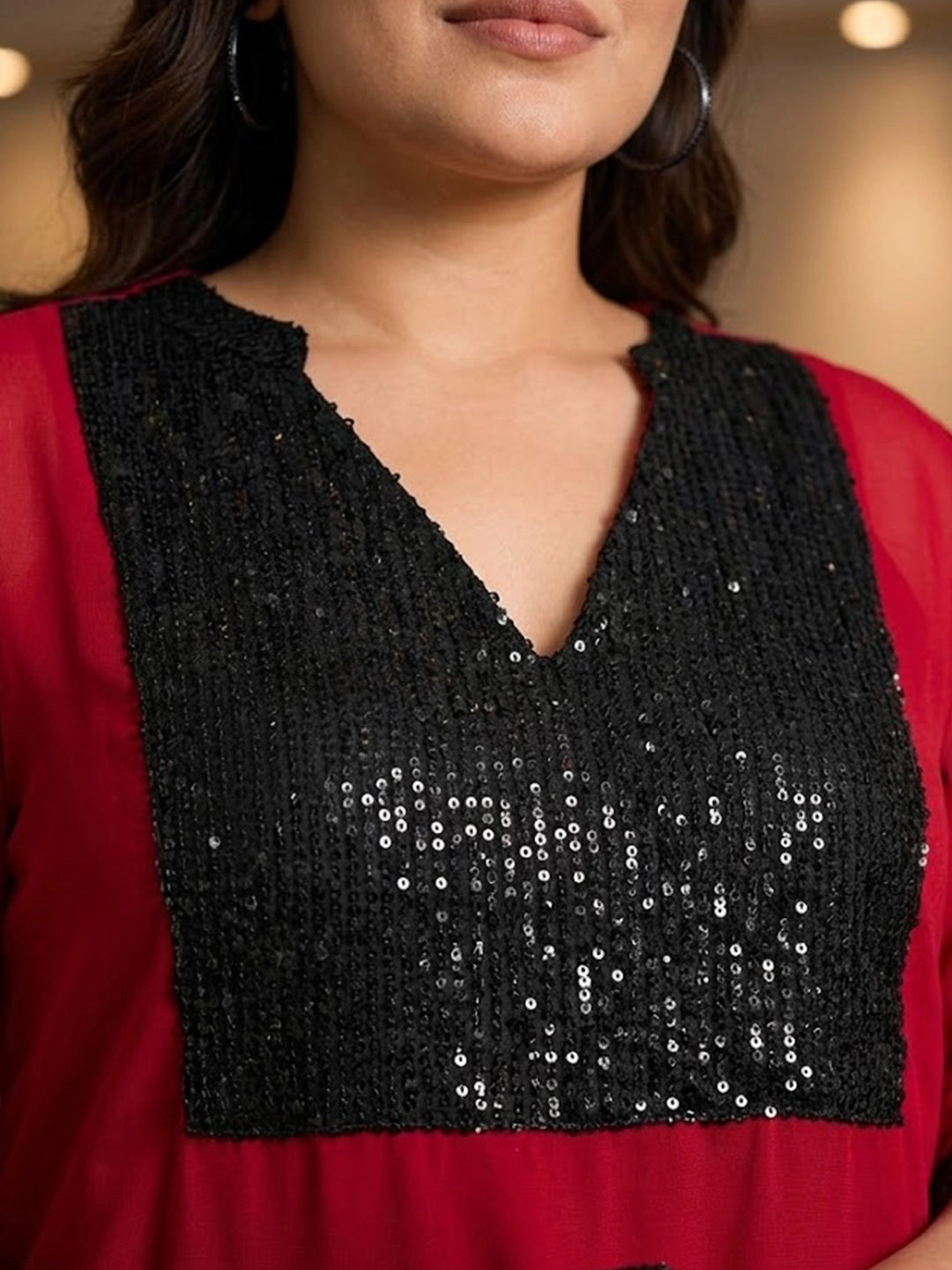 Red tunic with sequence yoke
