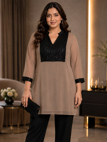 Beige tunic with sequence yoke