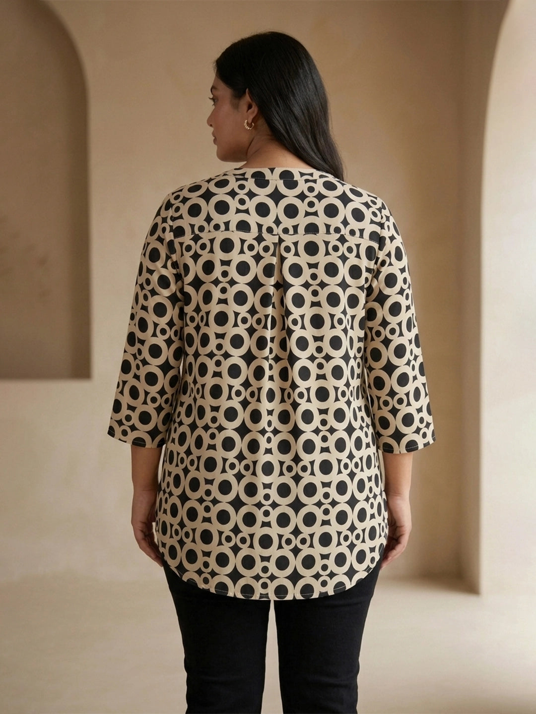 black geometric crepe shirt — close-up detail