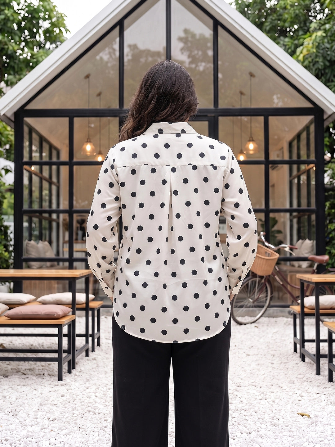black polka satin shirt — close-up detail
