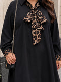 black moss crepe dress — side view