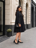 black moss crepe dress — back view