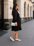 black moss crepe dress — back view