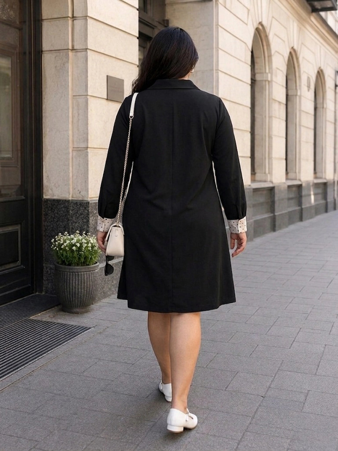 black moss crepe dress — close-up detail