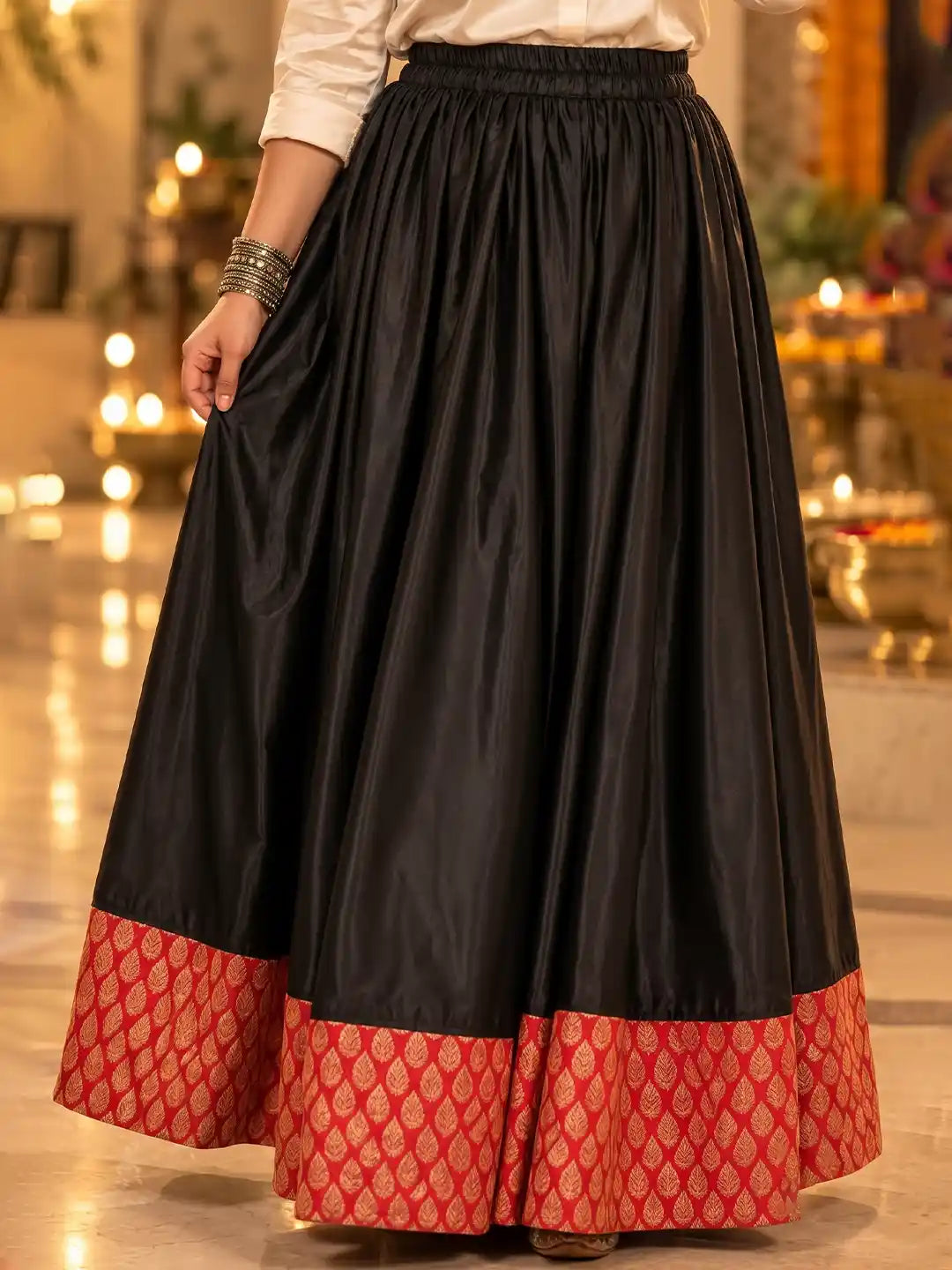 Black flared brocade skirt