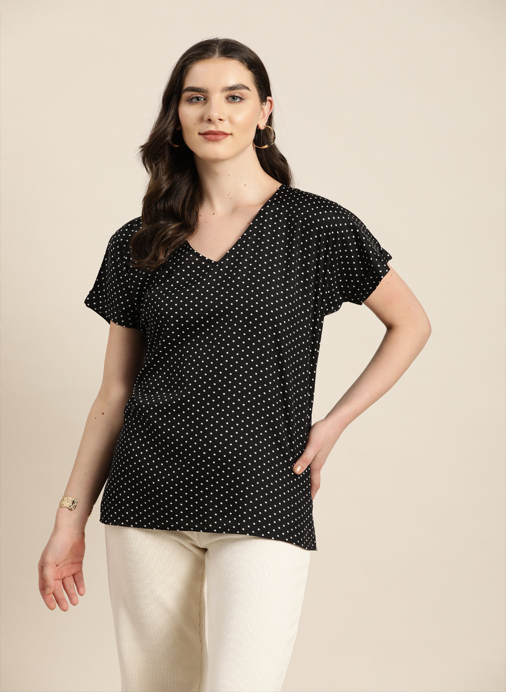 black polka drop shoulder top