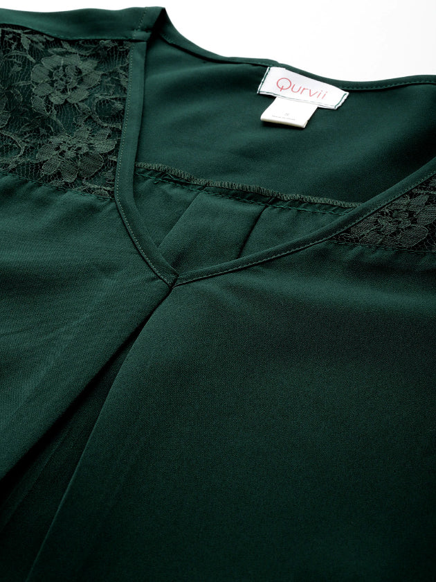 Emerald green crepe top with floral net sleeves and yoke