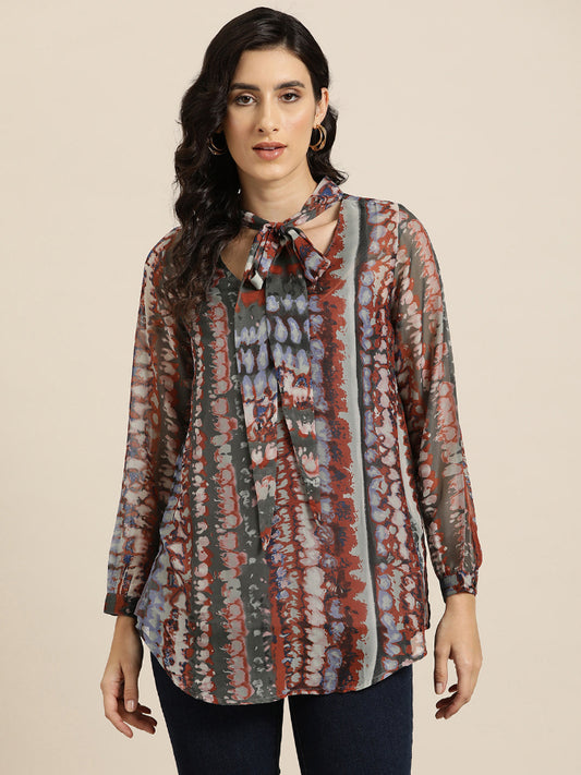 Rust marble-printed tie top with full cuff sleeves