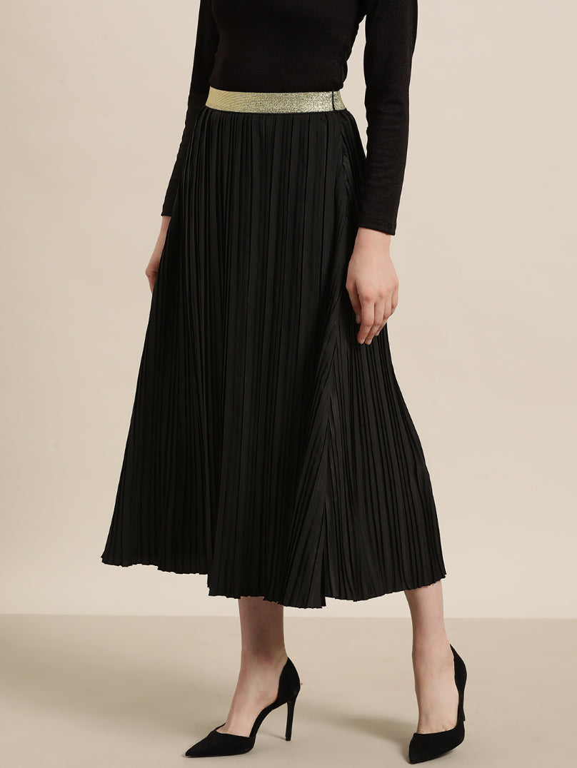 Black long pleated party skirt with a glittery elastic waistband