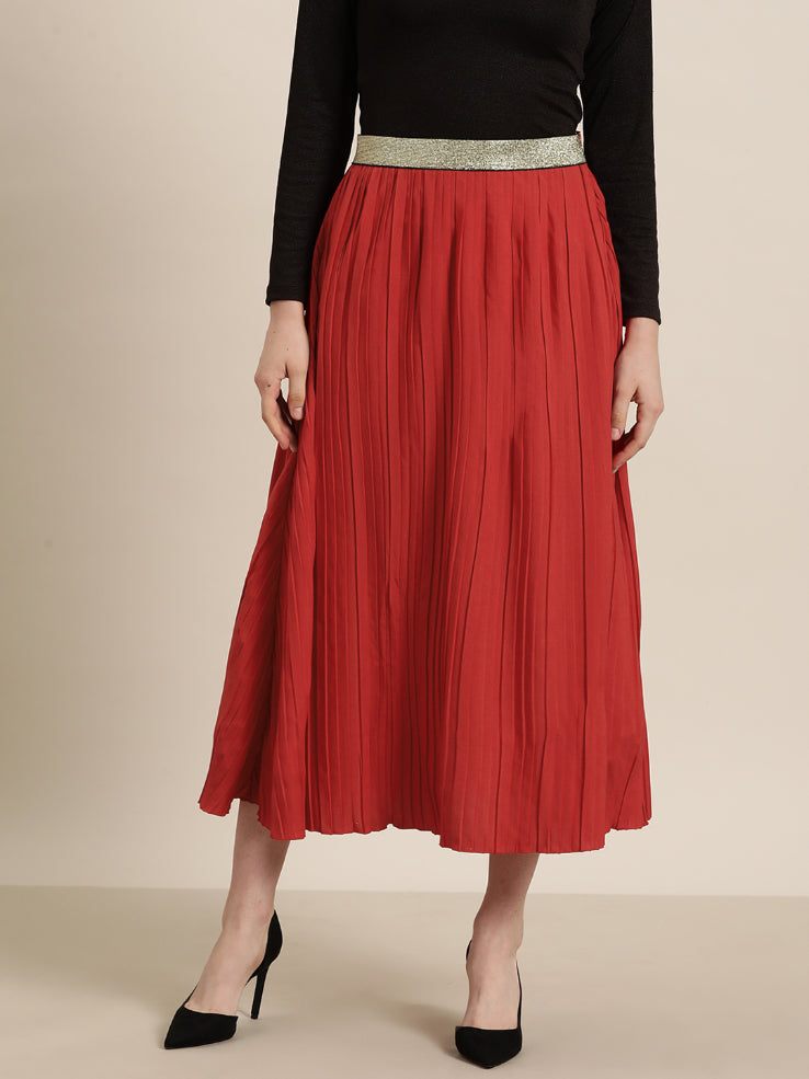 Red long pleated party skirt with a glittery elastic waistband