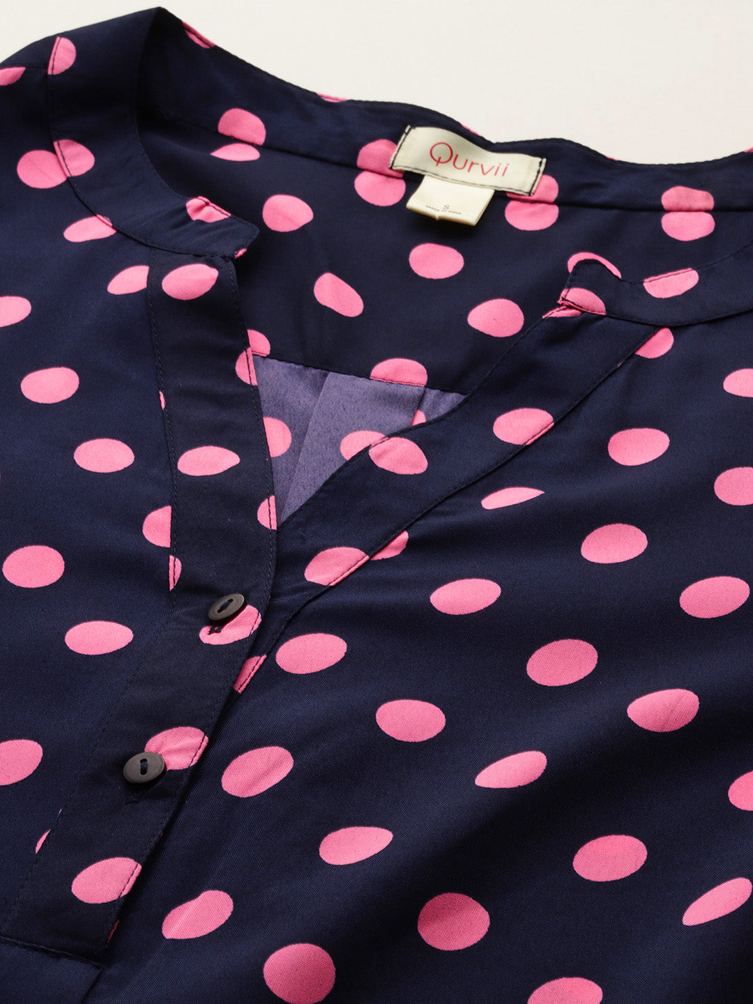 Navy and pink polka dot shirt