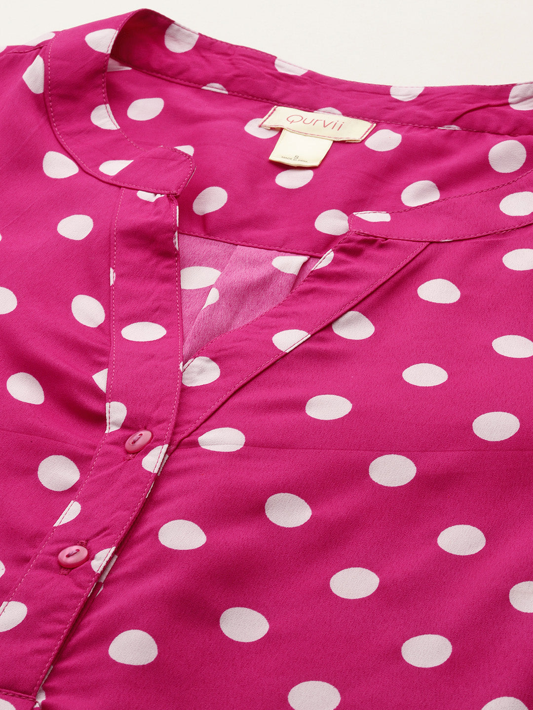 Hot pink and white polka dot shirt