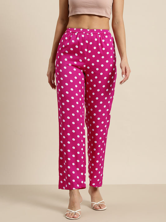 Hot pink and white polka dot trousers
