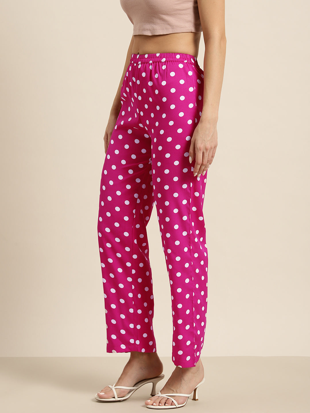 Hot pink and white polka dot trousers