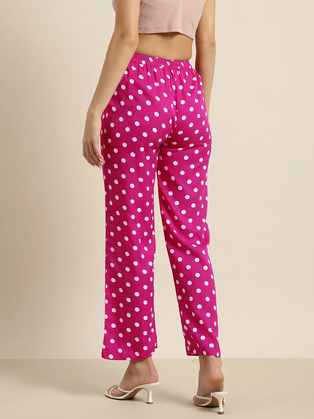 Hot pink and white polka dot trousers