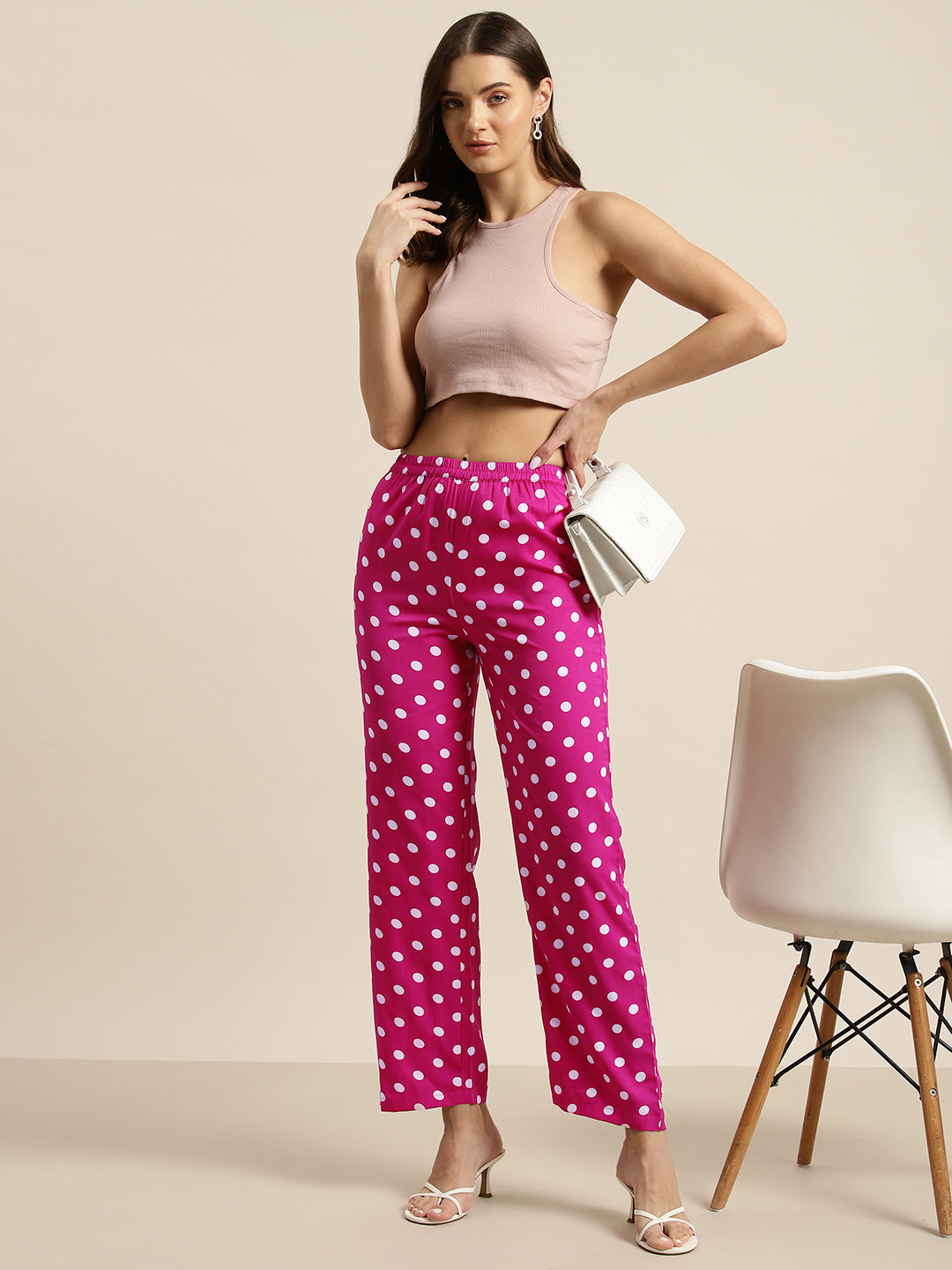 Hot pink and white polka dot trousers