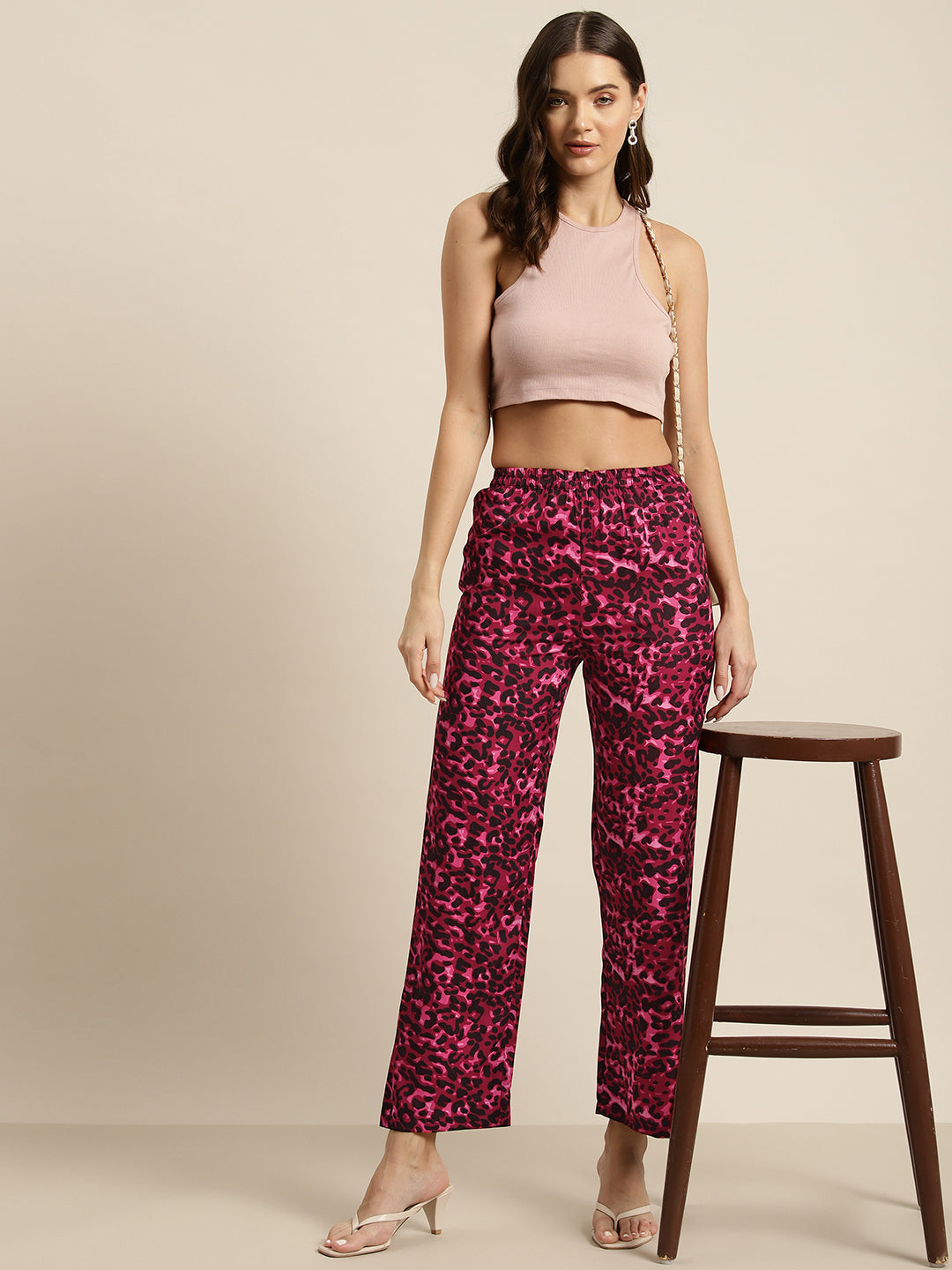 Wine and black leopard print trousers