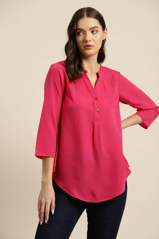 Hot pink crepe half placket shirt.