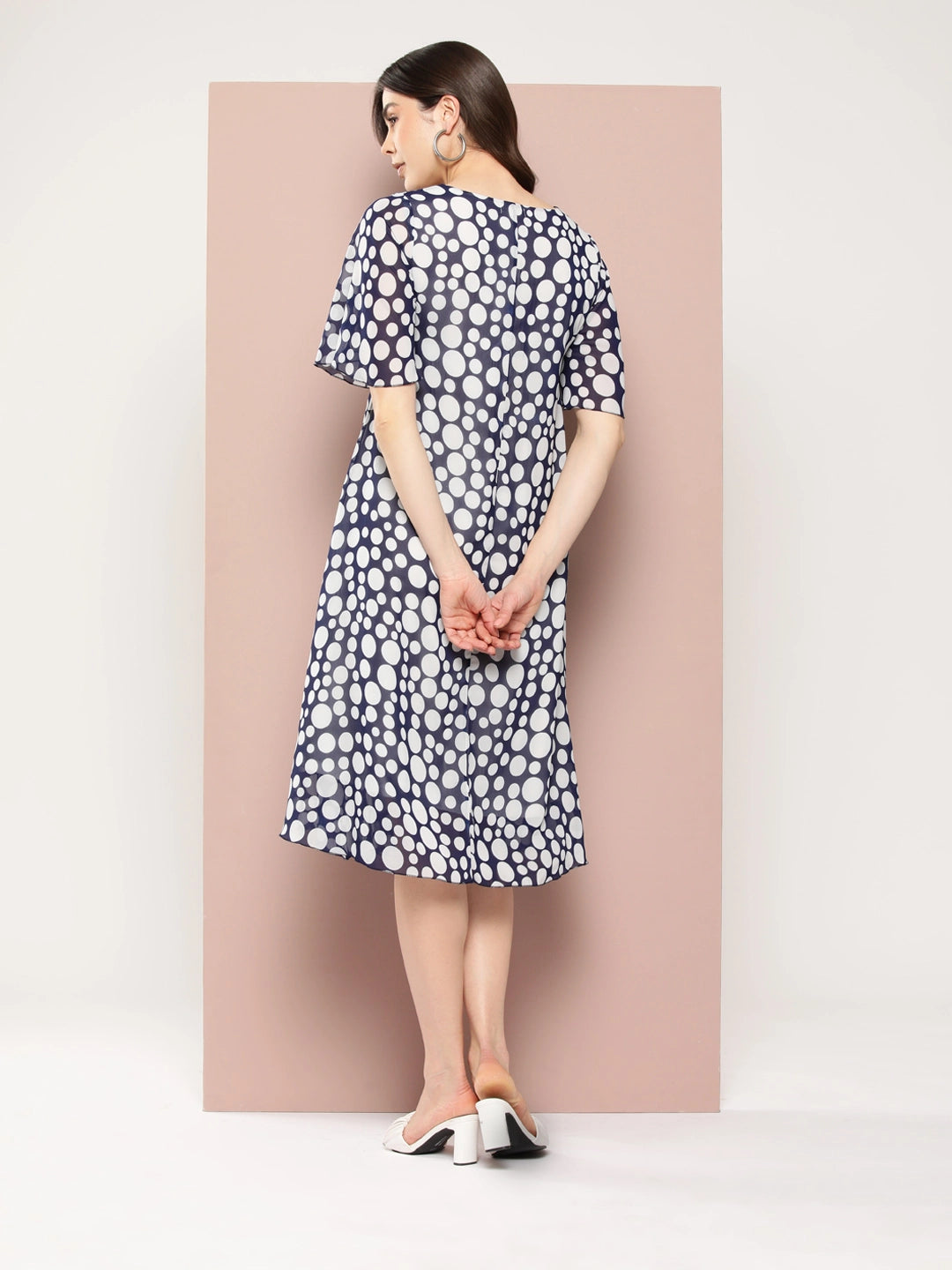 Navy polka georgette A-line dress with V-neck and bell sleeves