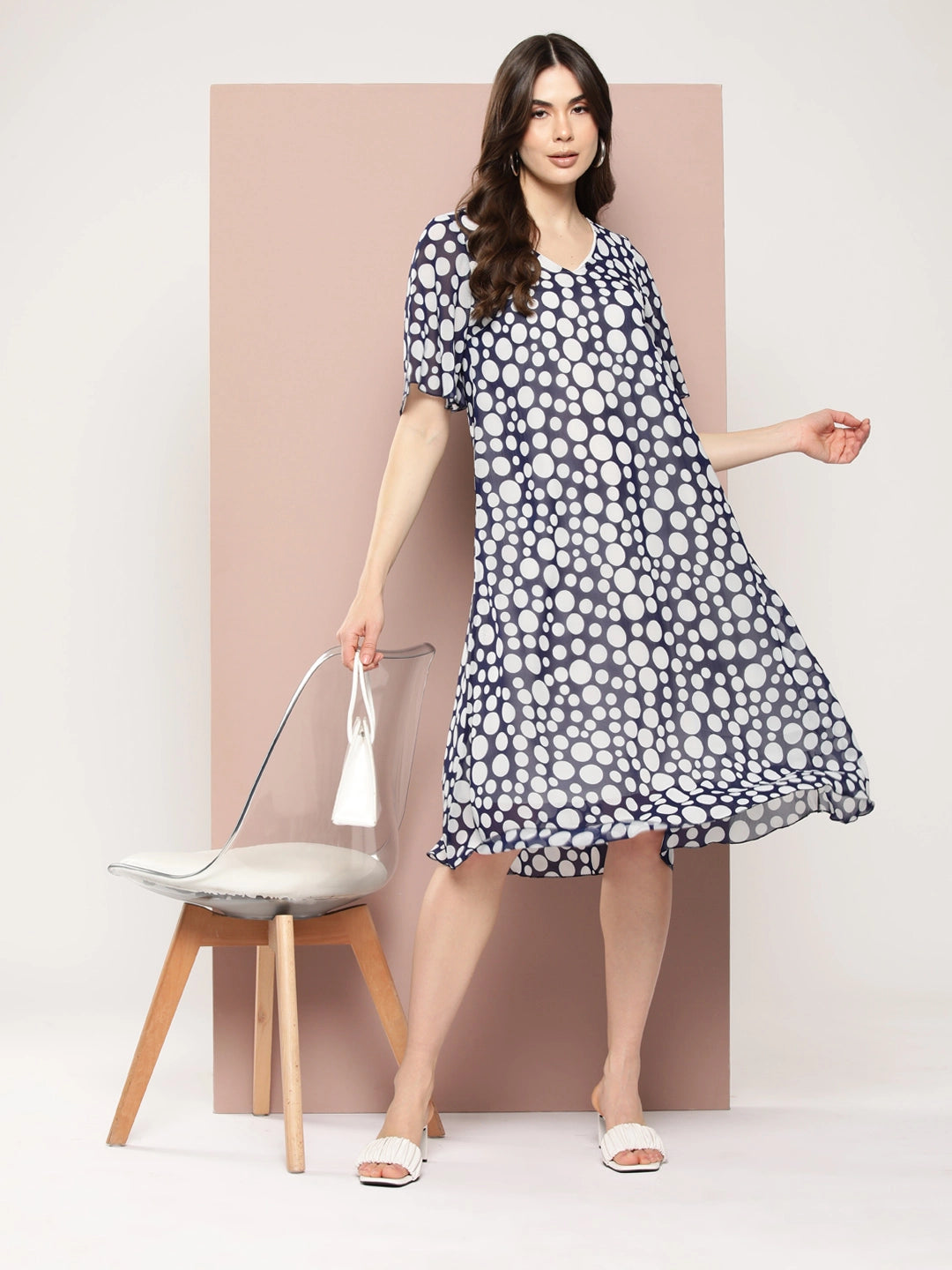 Navy polka georgette A-line dress with V-neck and bell sleeves