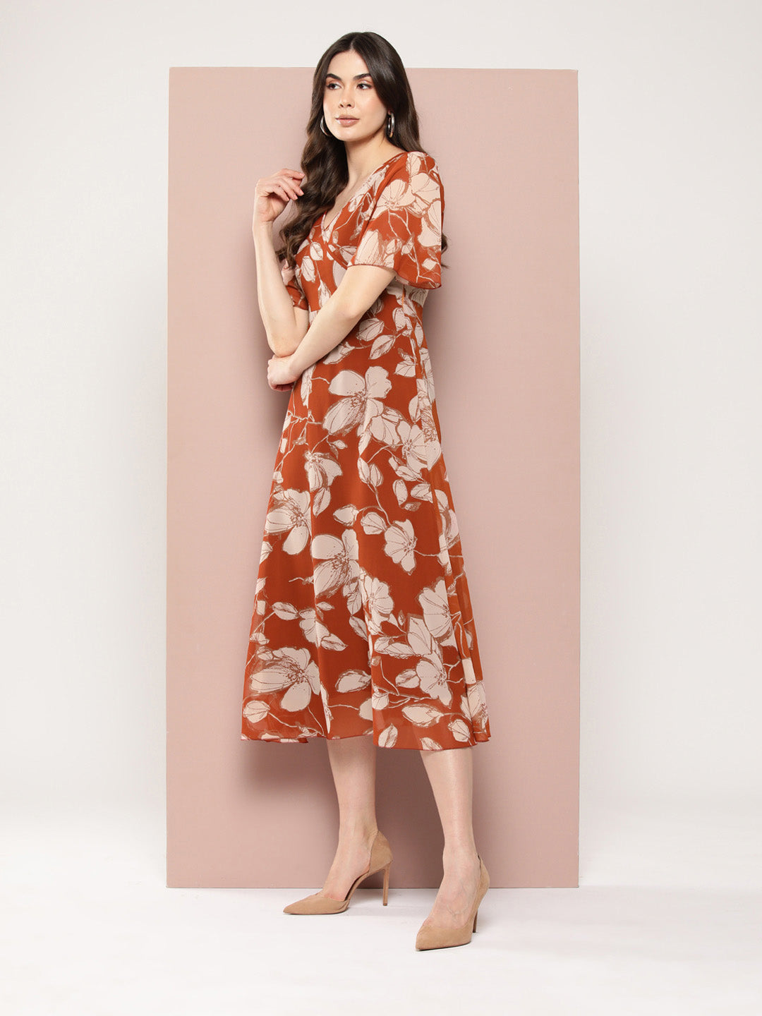 Rust floral print dress with a faux wrap-around dress.