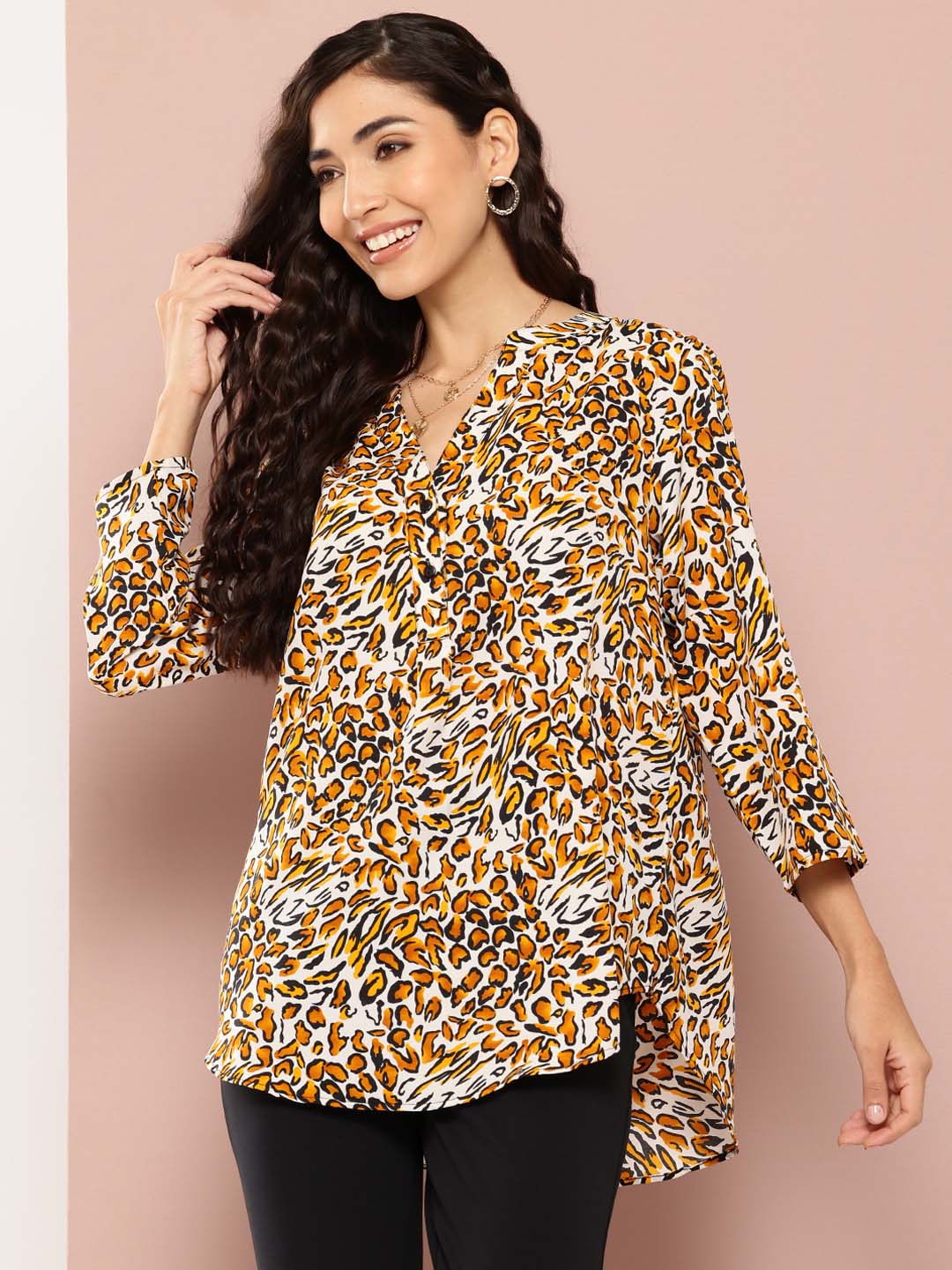 Black and white leopard print shirt half placket and mandarin collar.