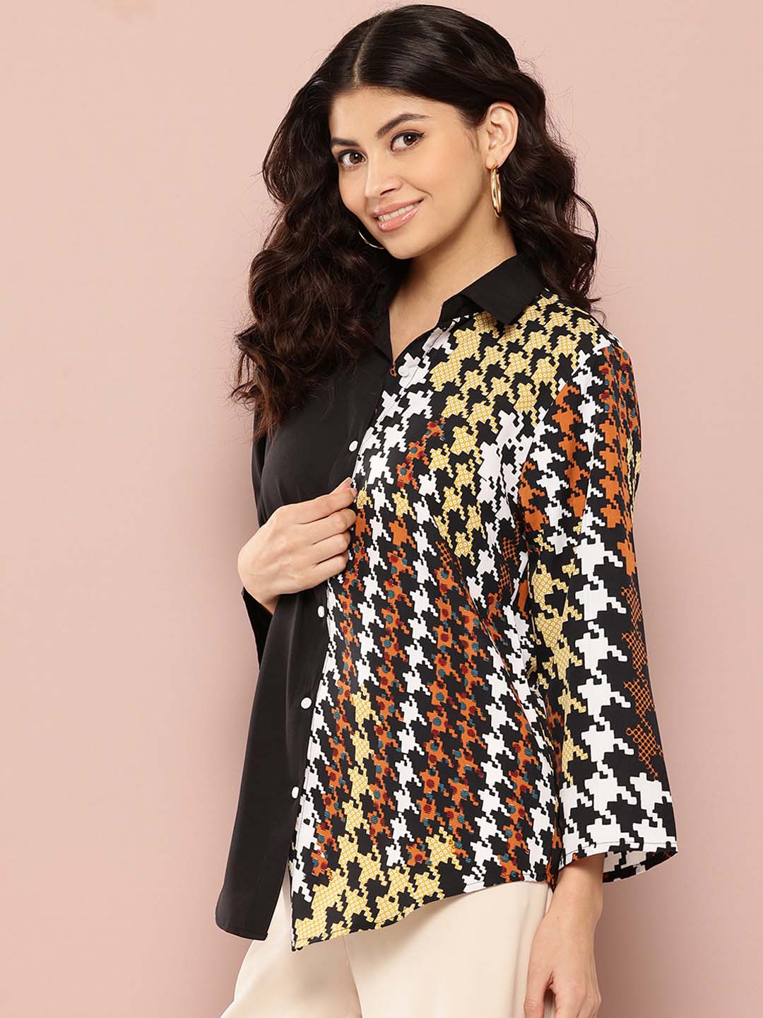 Black and Multi colorblock shirt with 3/4 sleeves.