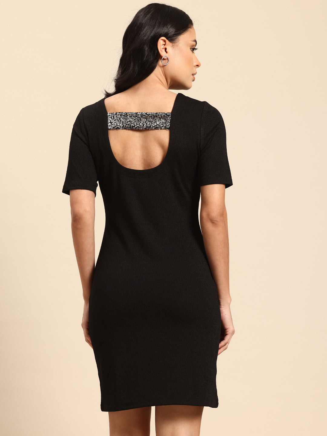 Black bodycon dress with back sequin strap