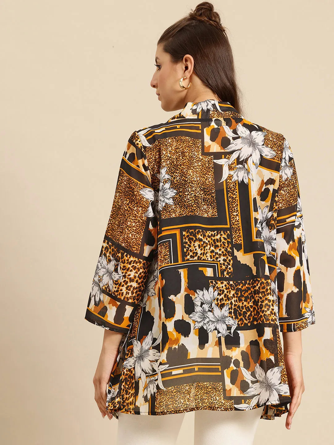 Multi Animal print shrug features 3/4 regular sleeves