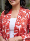 red geometric crepe shrug — side view