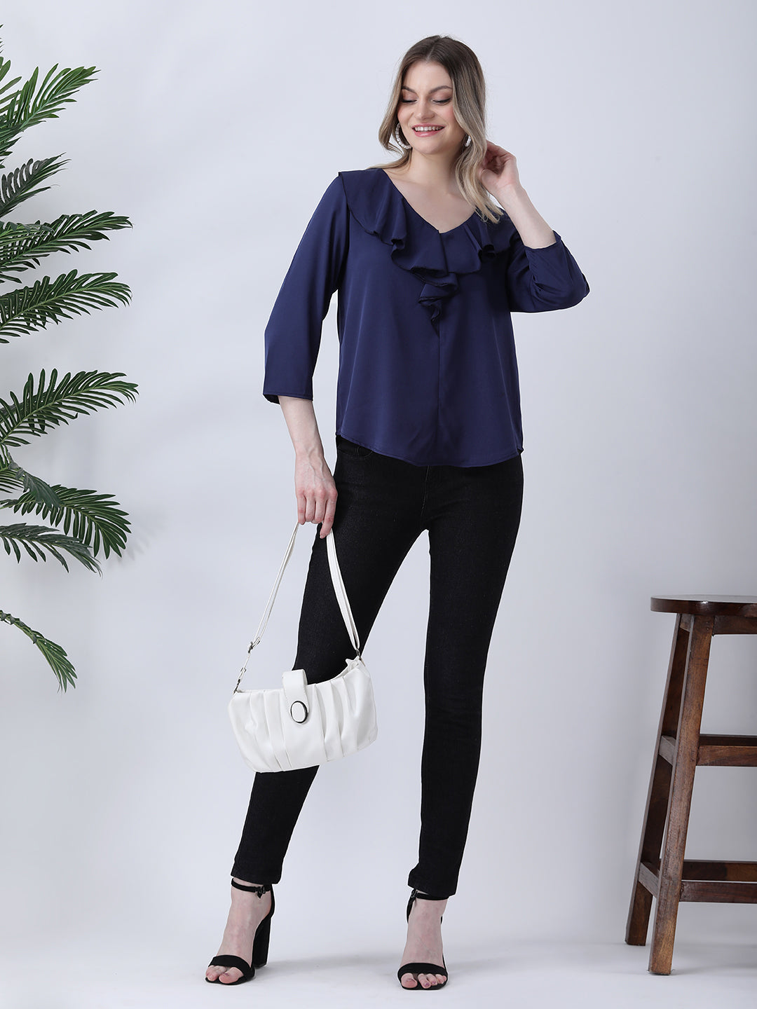 Navy ruffle neck top