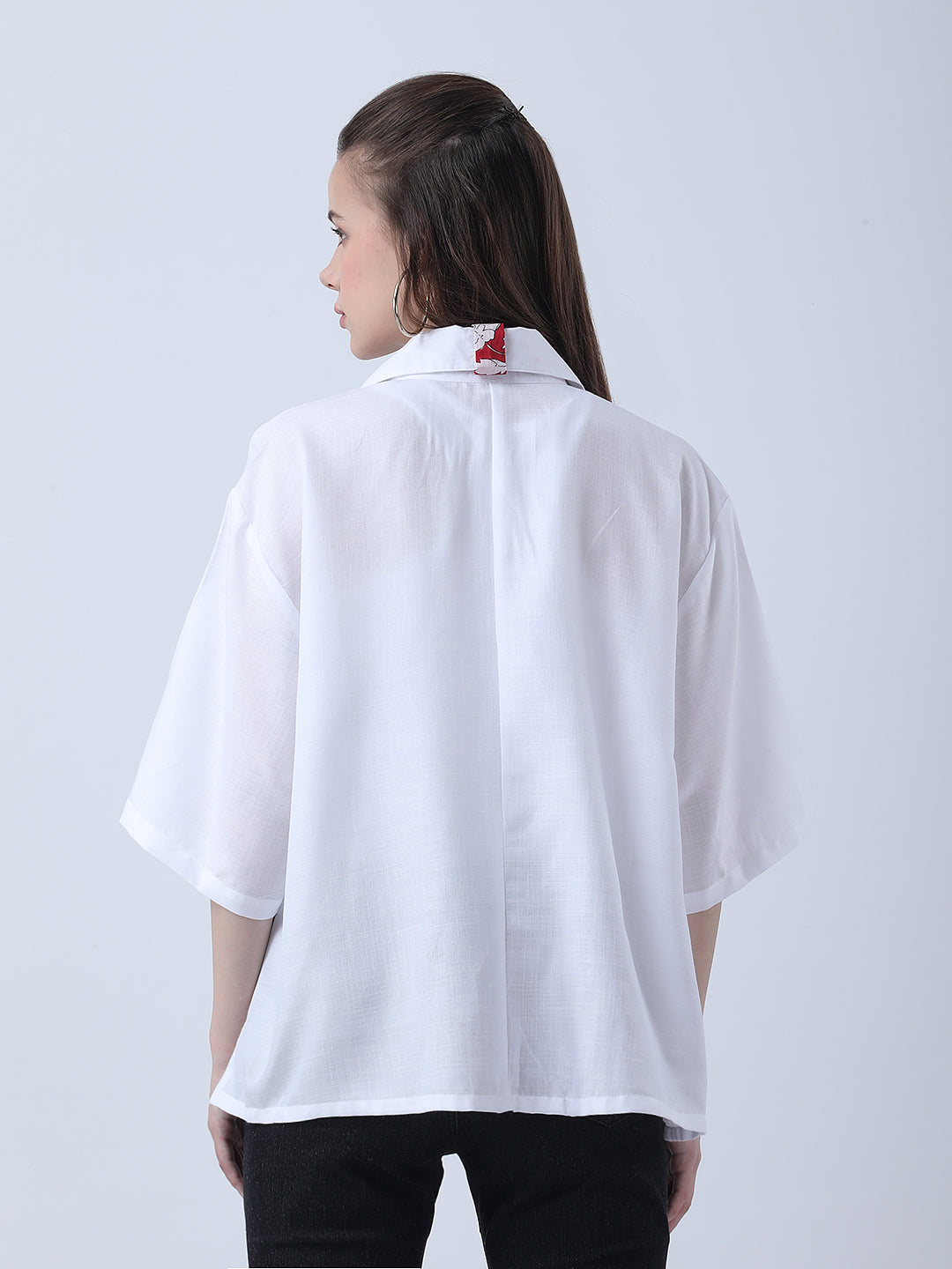 White oversized shirt with block print embelishments