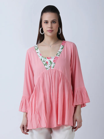 Peplum rayon top with printed neckline