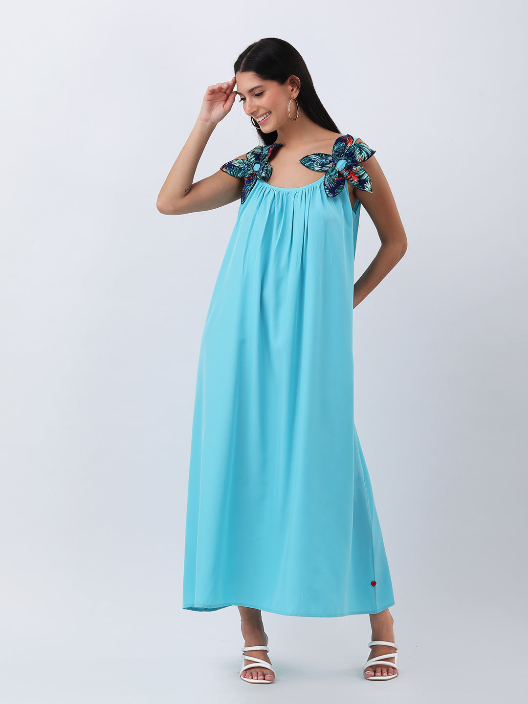 Turquoise maxi dress with statement flower bow