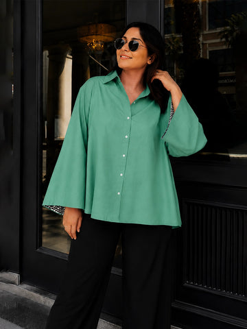Green poplin shirt with printing detailing in inner sleeve