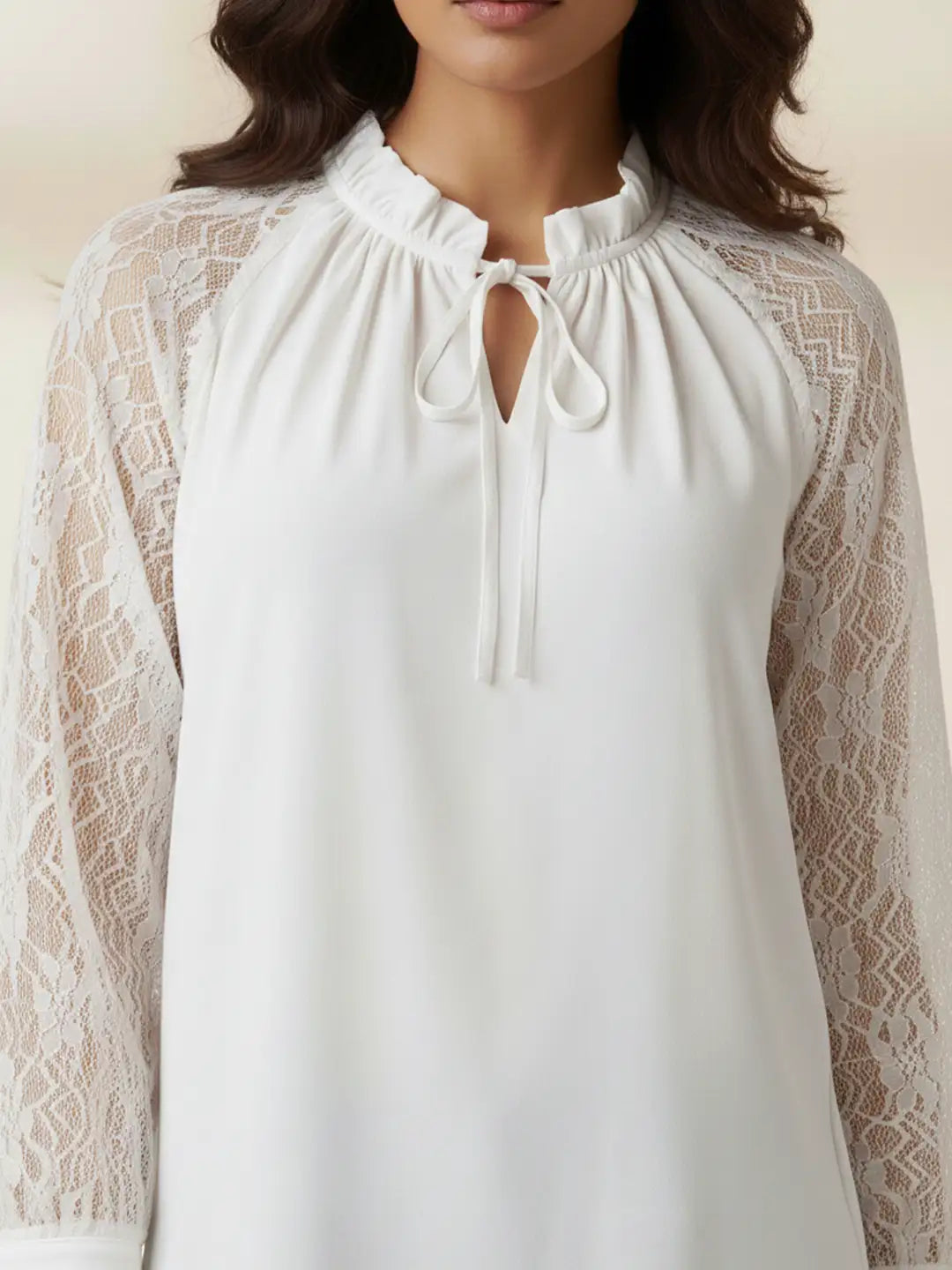 White tie-up neck top with sheer lace sleeves
