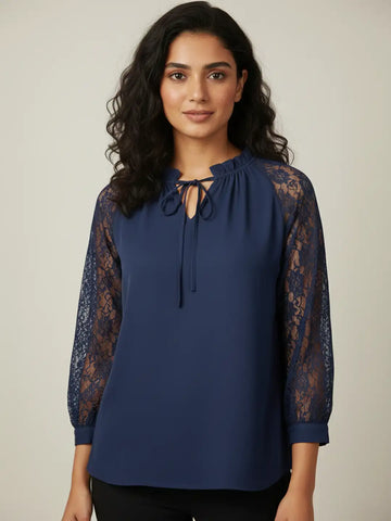 Navy tie-up neck top with sheer lace sleeves