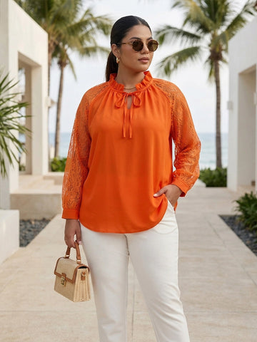 Orange tie-up neck top with sheer lace sleeves